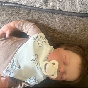 Newborn boy realistic looking